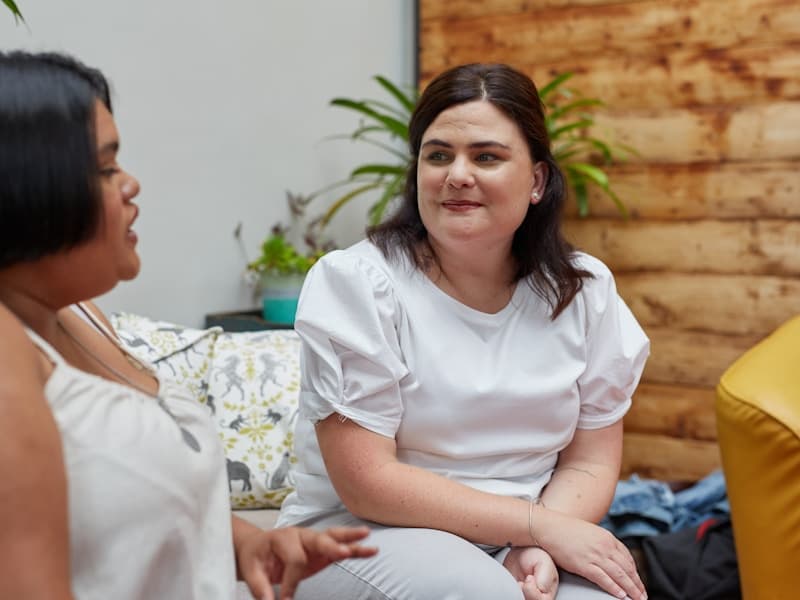 Two women in supportive conversation - mental health support